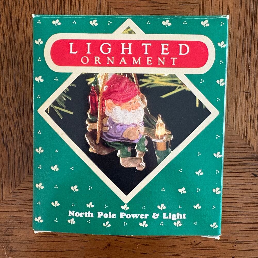 Vintage Christmas ornament: North Pole power and light Santa